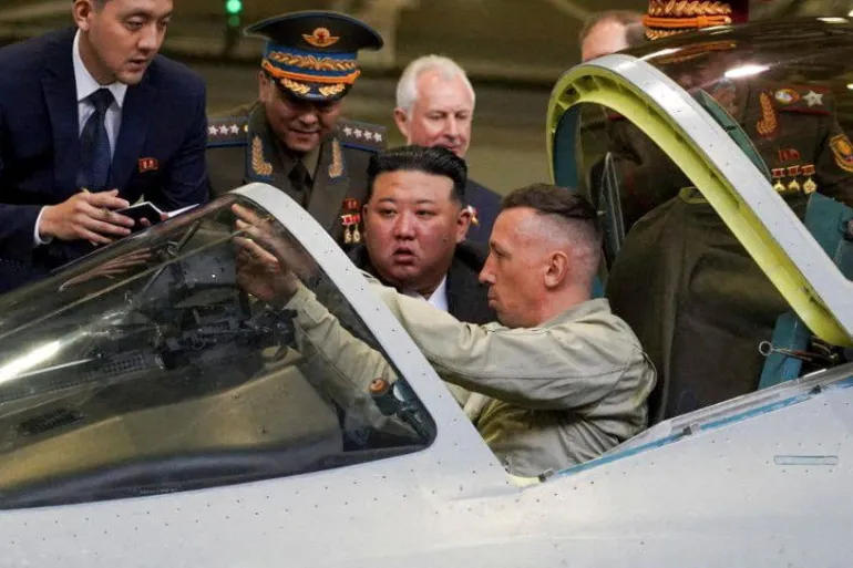 Kim checks out fighter jets